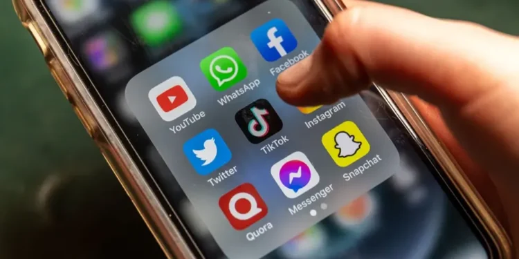 TikTok logo illustrating encryption policy debate- Getty Images/BBC