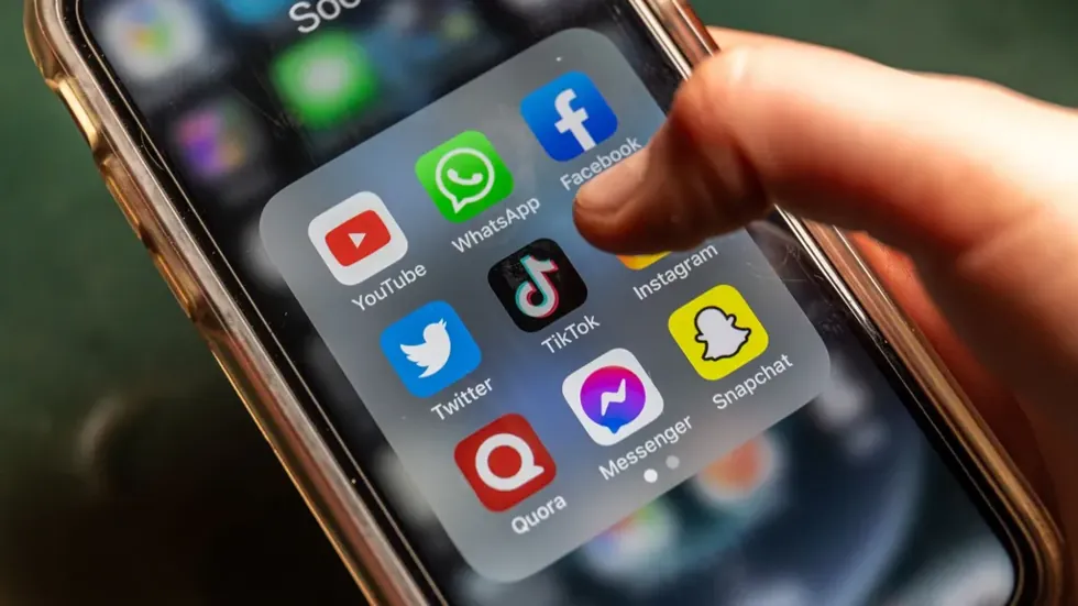 TikTok logo illustrating encryption policy debate- Getty Images/BBC
