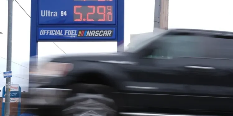 U.S. gas station sign showing prices above four dollars- AP Photo/Matt Rourke