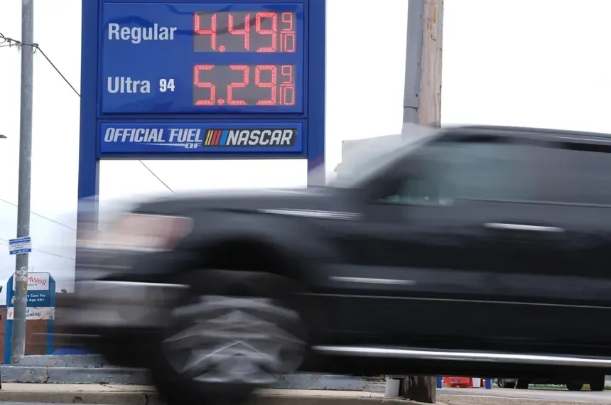 U.S. gas station sign showing prices above four dollars- AP Photo/Matt Rourke
