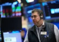 Traders monitor US stock indexes as oil prices rise amid Iran tensions - AP Photo/Seth Wenig
