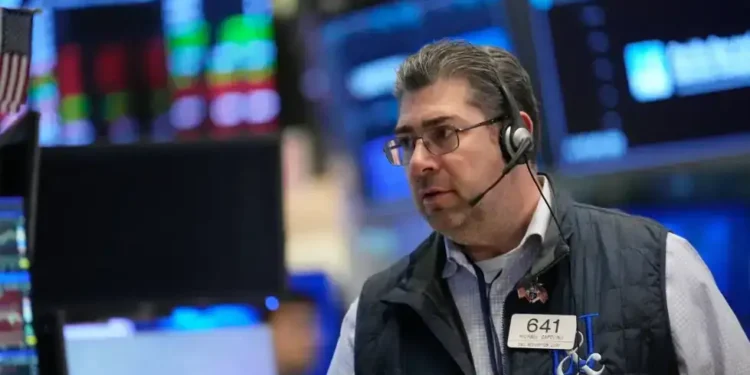Traders monitor US stock indexes as oil prices rise amid Iran tensions - AP Photo/Seth Wenig