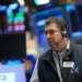 Traders monitor US stock indexes as oil prices rise amid Iran tensions - AP Photo/Seth Wenig