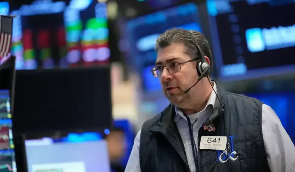 Traders monitor US stock indexes as oil prices rise amid Iran tensions - AP Photo/Seth Wenig