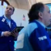 Wall Street traders react as oil prices fall during geopolitical tensions - AP Photo/Seth Wenig