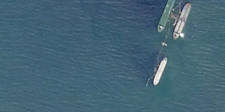 U.S. naval presence enforcing oil tanker blockade near Venezuelan waters - 2025 PLANET LABS PBC via REUTERS
