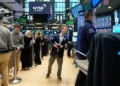 Traders watch Wall Street indexes rebound as oil prices ease - AP Photo/Seth Wenig