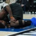 Anthony Edwards reacts after sustaining left knee injury during NBA playoff game - AP Photo/Abbie Parr
