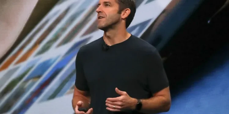 John Ternus speaking at Apple event during leadership transition - AP Photo/Bebeto Matthews, File