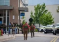 Police respond to shooting at Baton Rouge shopping mall scene - AP Photo/Matthew Hinton