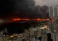 Smoke rises from BYD Shenzhen test vehicle garage fire - Social Media via Reuters