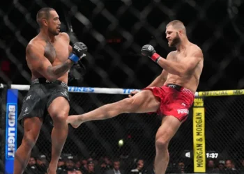 Carlos Ulberg celebrates after knockout win over Jiri Prochazka at UFC 327 - AP Photo/Rebecca Blackwell