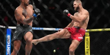 Carlos Ulberg celebrates after knockout win over Jiri Prochazka at UFC 327 - AP Photo/Rebecca Blackwell