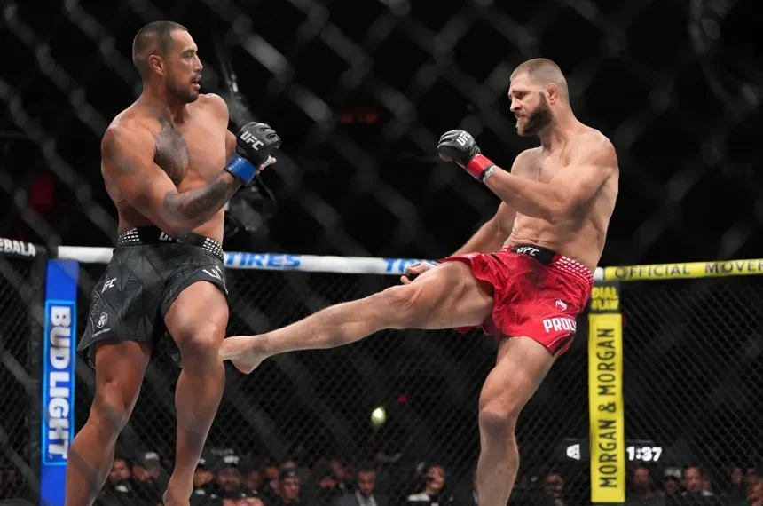 Carlos Ulberg celebrates after knockout win over Jiri Prochazka at UFC 327 - AP Photo/Rebecca Blackwell