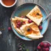 Different types of pancakes from around the world on plates - asab974/Adobe Stock via CNN