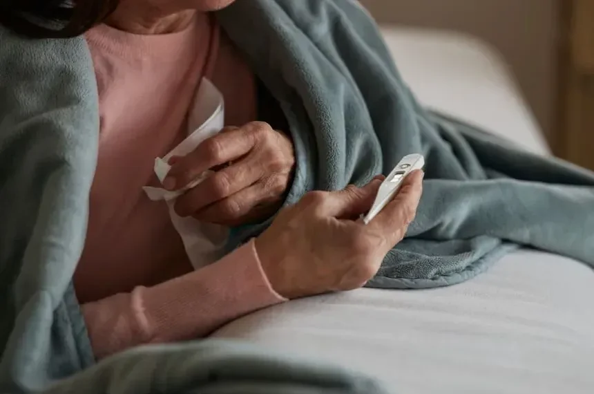 Healthcare workers manage rising influenza cases during holiday travel surge - SanyaSM/E+/Getty Images