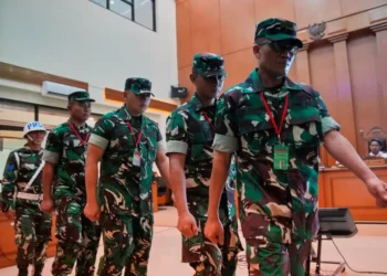 Indonesian military court trial over acid attack on anti-corruption investigator - AP Photo/Tatan Syuflana