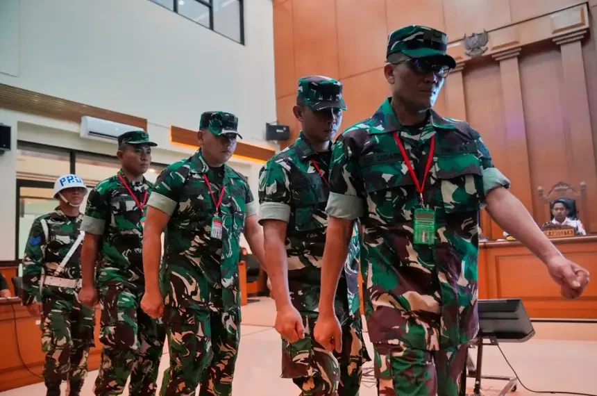 Indonesian military court trial over acid attack on anti-corruption investigator - AP Photo/Tatan Syuflana