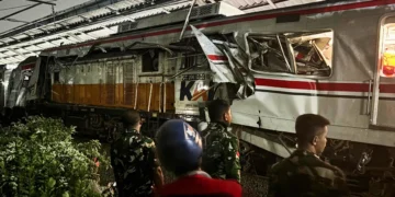 Damaged commuter trains after collision near Jakarta rail line - AP Photo/Fadian Syam