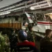 Damaged commuter trains after collision near Jakarta rail line - AP Photo/Fadian Syam