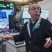 Intel logo displayed as stock markets reach record highs - AP Photo/Richard Drew