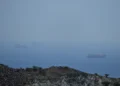 Stranded cargo ships in Strait of Hormuz amid regional tensions - AP Photo