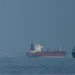 Tankers alter course amid US naval blockade near Iran - AP Photo/Altaf Qadri,File