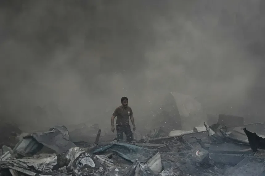 Israel Iran escalation live tracker with diplomatic pause updates - AP Photo/Bilal Hussein