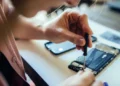 Smartphone battery replacement under new EU regulatory compliance standards - Image credit: Guido Mieth / Getty Images