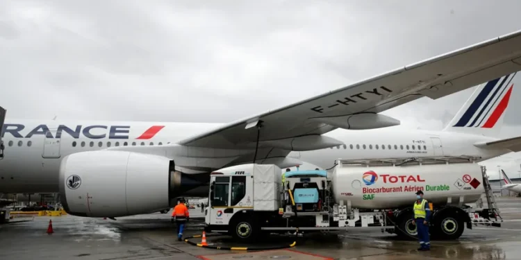 Aircraft refueling amid jet fuel shortage affecting global airline operations - AP Photo/Christophe Ena, File