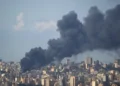 Smoke rises over central Beirut after Israeli airstrikes - AP Photo/Hassan Ammar