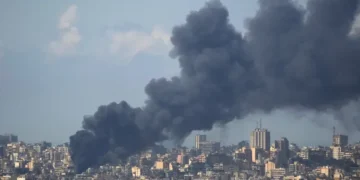 Smoke rises over central Beirut after Israeli airstrikes - AP Photo/Hassan Ammar