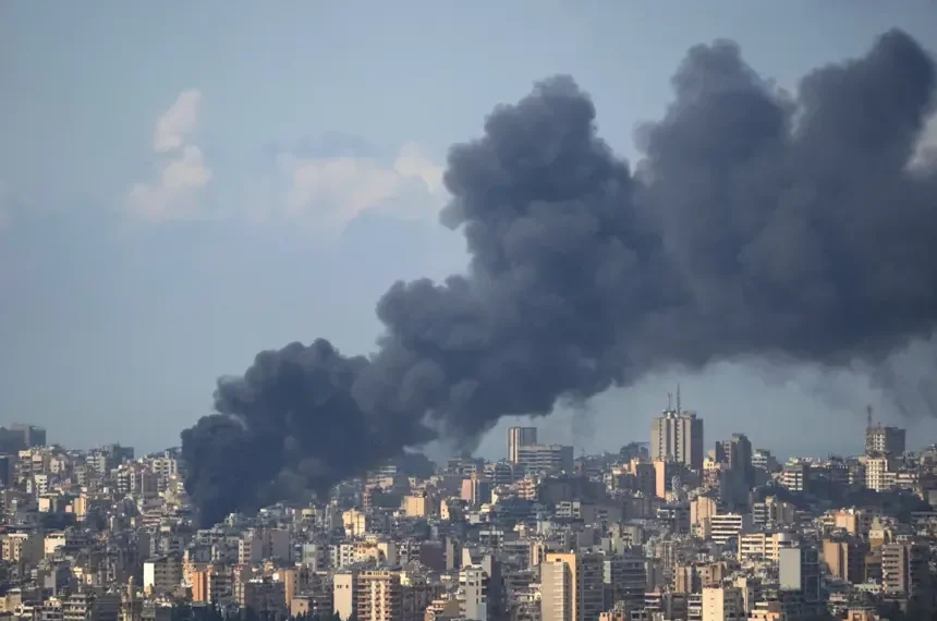 Smoke rises over central Beirut after Israeli airstrikes - AP Photo/Hassan Ammar