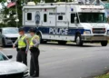 Police vehicles respond to park shooting in Winston-Salem North Carolina - AP Photo/Erik Verduzco