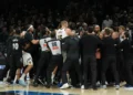 Nikola Jokic and Julius Randle during heated Nuggets Timberwolves game altercation - AP Photo/Abbie Parr