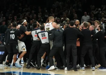 Nikola Jokic and Julius Randle during heated Nuggets Timberwolves game altercation - AP Photo/Abbie Parr