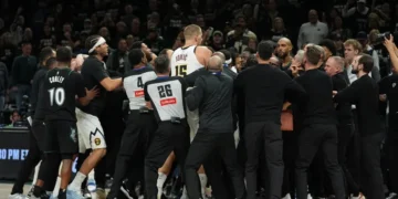 Nikola Jokic and Julius Randle during heated Nuggets Timberwolves game altercation - AP Photo/Abbie Parr