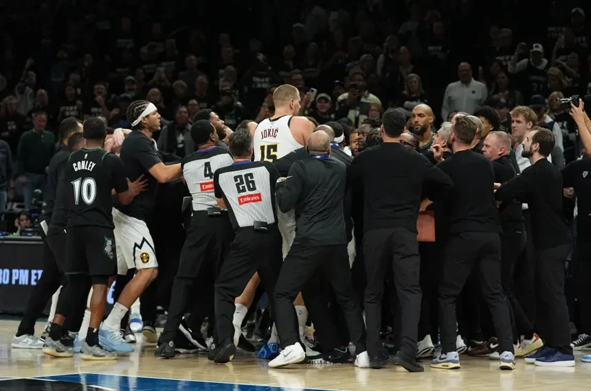 Nikola Jokic and Julius Randle during heated Nuggets Timberwolves game altercation - AP Photo/Abbie Parr