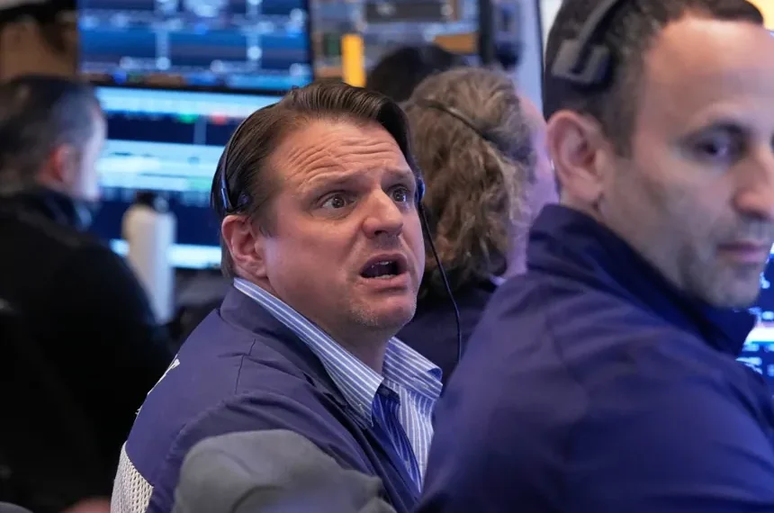 Traders monitor oil prices and US stock market movement - AP Photo/Richard Drew