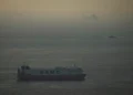 Oil tanker and refinery symbolize modern energy market resilience - AP Photo, File
