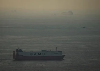 Oil tanker and refinery symbolize modern energy market resilience - AP Photo, File