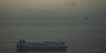 Oil tanker and refinery symbolize modern energy market resilience - AP Photo, File