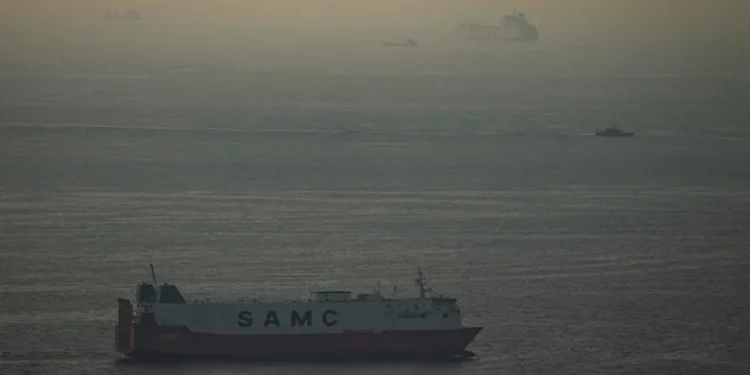 Oil tanker and refinery symbolize modern energy market resilience - AP Photo, File