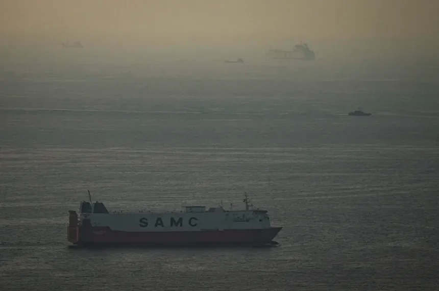 Oil tanker and refinery symbolize modern energy market resilience - AP Photo, File