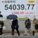 Oil traders monitor screens as Wall Street reacts to Iran risks - AP Photo/Eugine Hoshiko