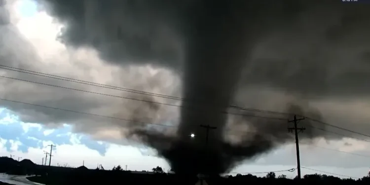 Damaged homes after Oklahoma tornado strikes Enid residential area - KWTV/KOTV via AP
