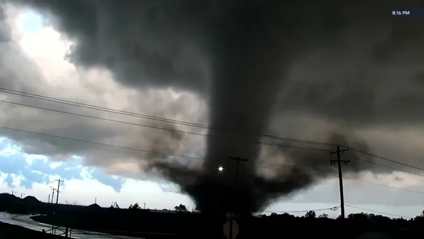 Damaged homes after Oklahoma tornado strikes Enid residential area - KWTV/KOTV via AP