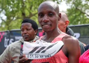 Sebastian Sawe crossing finish line breaking two hour marathon barrier - AP Photo/ian Walton