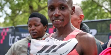 Sebastian Sawe crossing finish line breaking two hour marathon barrier - AP Photo/ian Walton