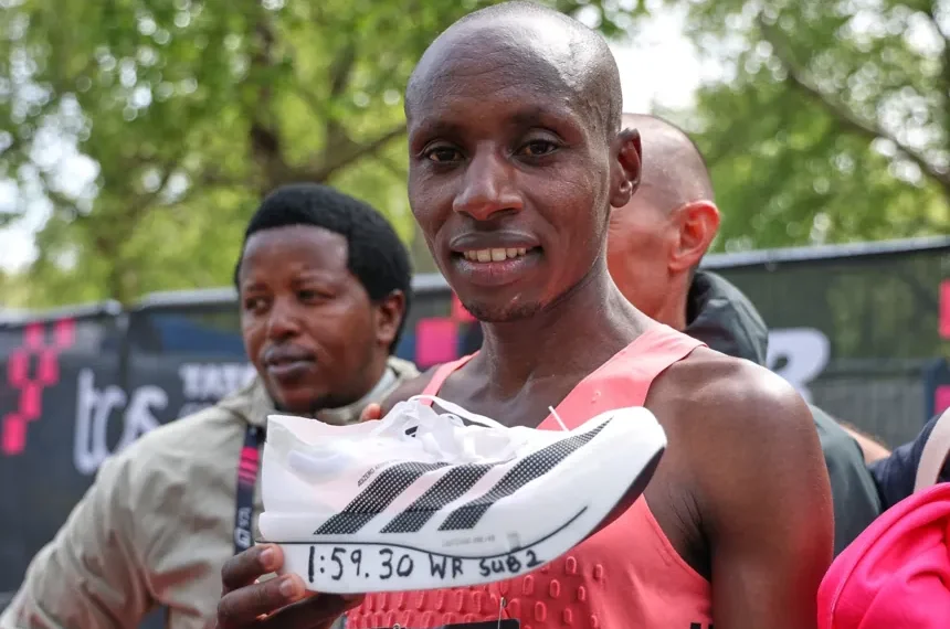 Sebastian Sawe crossing finish line breaking two hour marathon barrier - AP Photo/ian Walton